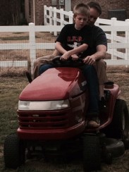 Kristopher mowing spring 2015